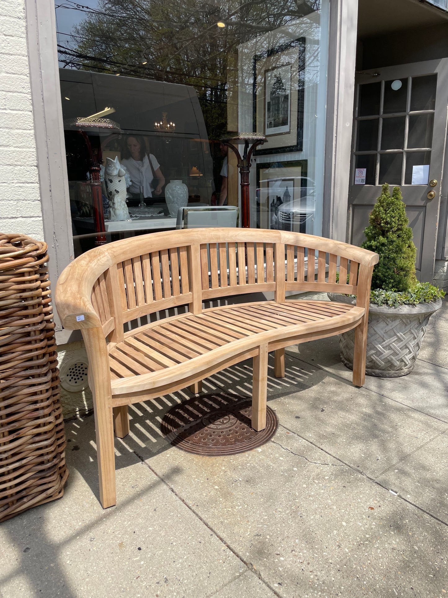 Curved three seater teak bench